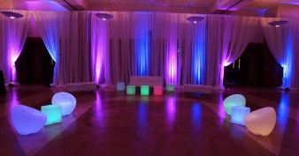 A room with colorful lights  Description automatically generated