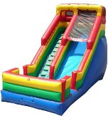 A colorful inflatable slide  Description automatically generated