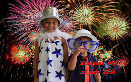 Two children posing for a picture  Description automatically generated